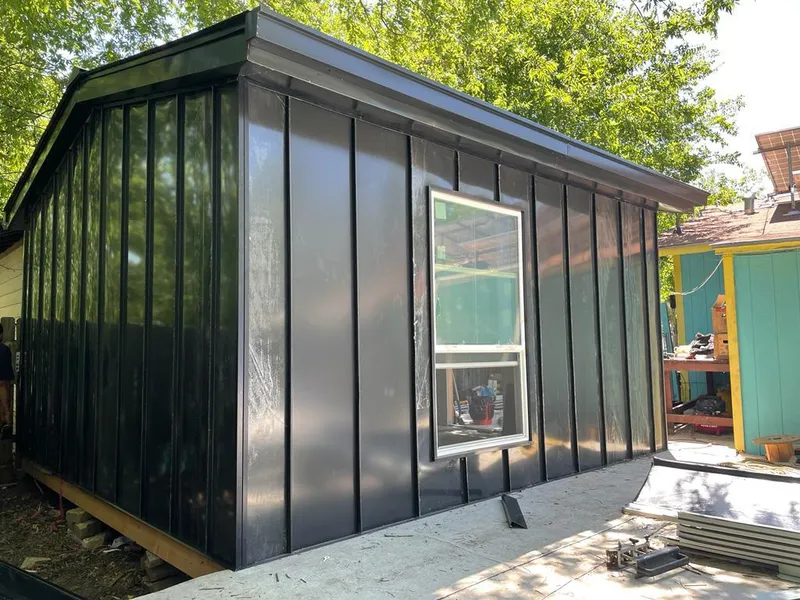 Black standing seam metal wall panels for Metal Roof Installation in Pembroke Park