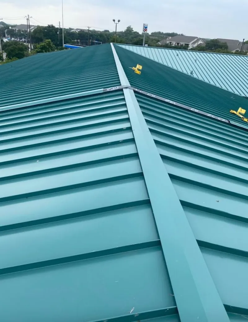 Green commercial metal roof ridge and valley for Metal Roof Repair in Pembroke Park